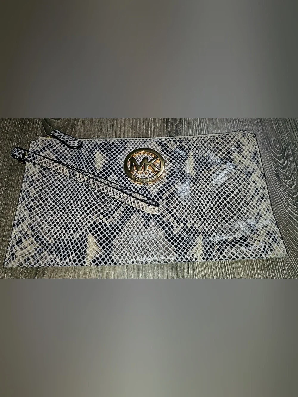 Authentic Michael Kors Snakeskin Large Wristlet Wallet with gold logo